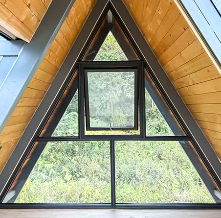 A-frame chalet with a triangular casement window, Kundasang Resort, Sabah