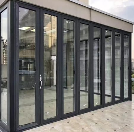 Bi-fold doors meeting at a building corner