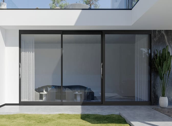 MT150 heavy-duty three-panel sliding door opening onto a lawn