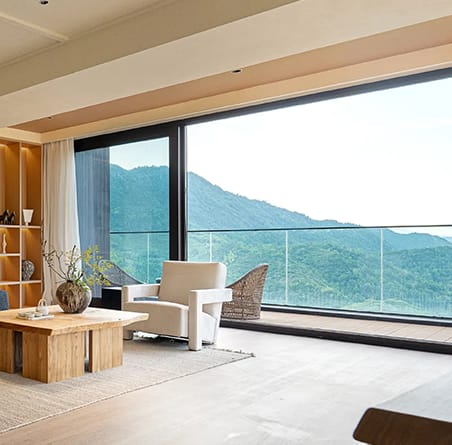 Living room with wide sliding doors facing green hills, Botolan, Zambales