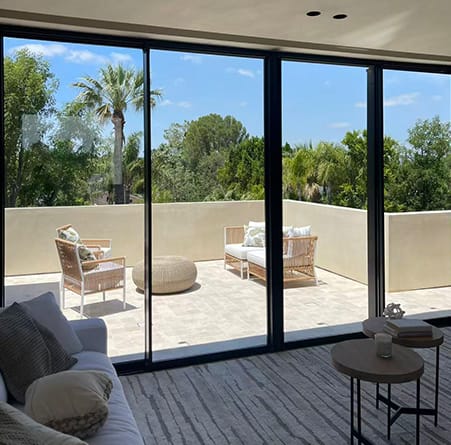 Sliding doors opening onto a pool terrace, Sherman Oaks, Los Angeles