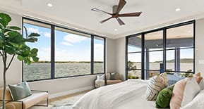 Bedroom with floor-to-ceiling sliding windows