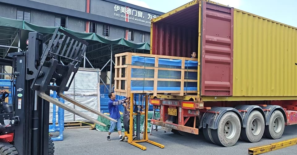 Crates being loaded into a container