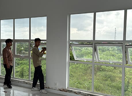Technician checking vent hardware